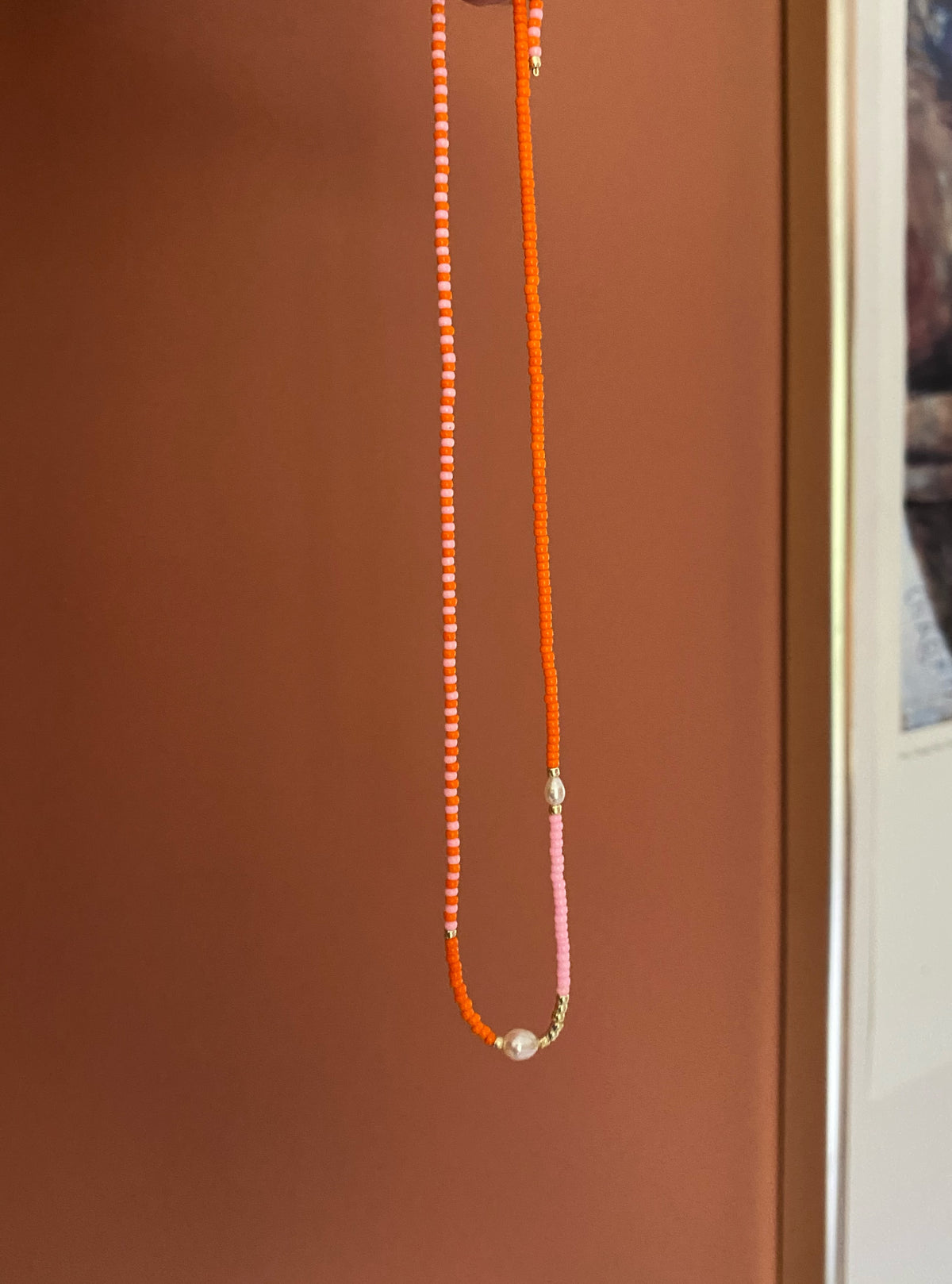 Orange pink vibrant pearl necklace