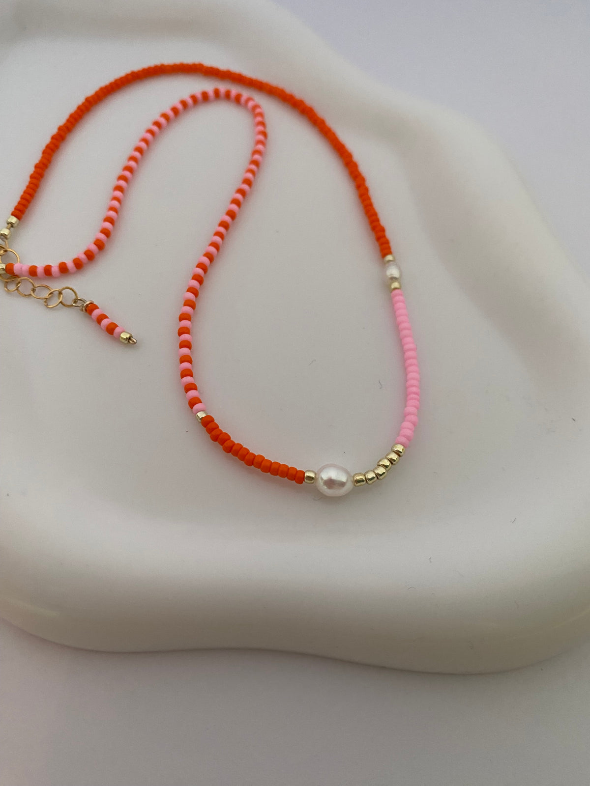 Orange pink vibrant pearl necklace