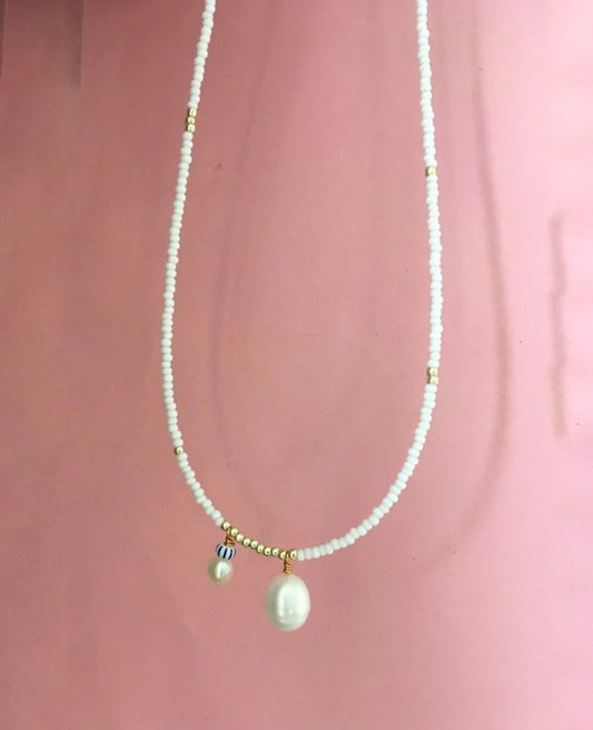 Golden pearl necklace