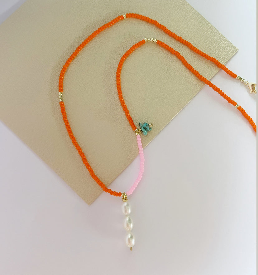 Sunset triple pearl necklace