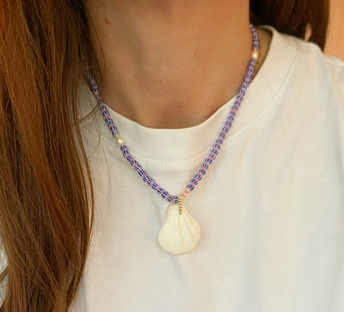 Beaded shell boho necklace with pearls.