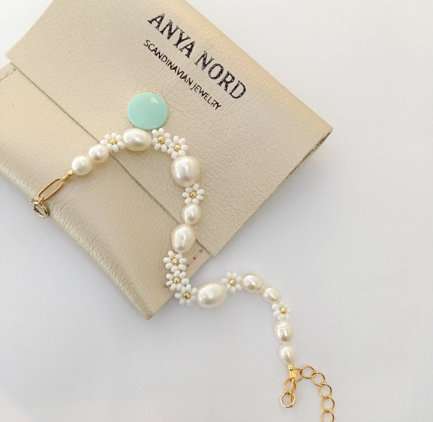 Pearl and white flower bracelet